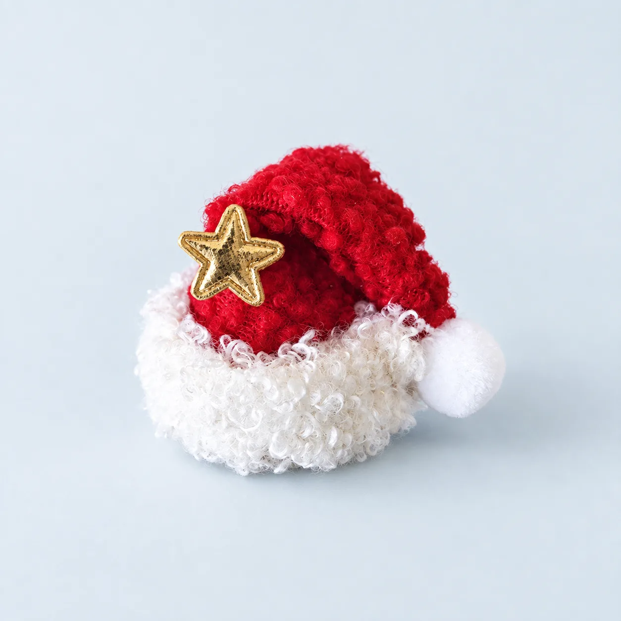Star-trim Santa hat hair clip