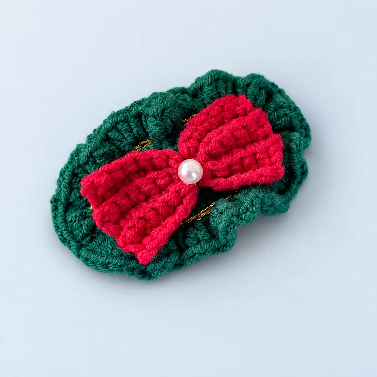 Red and green oval hair clip