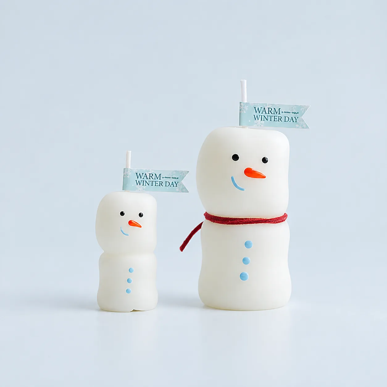 Snowman candle duo