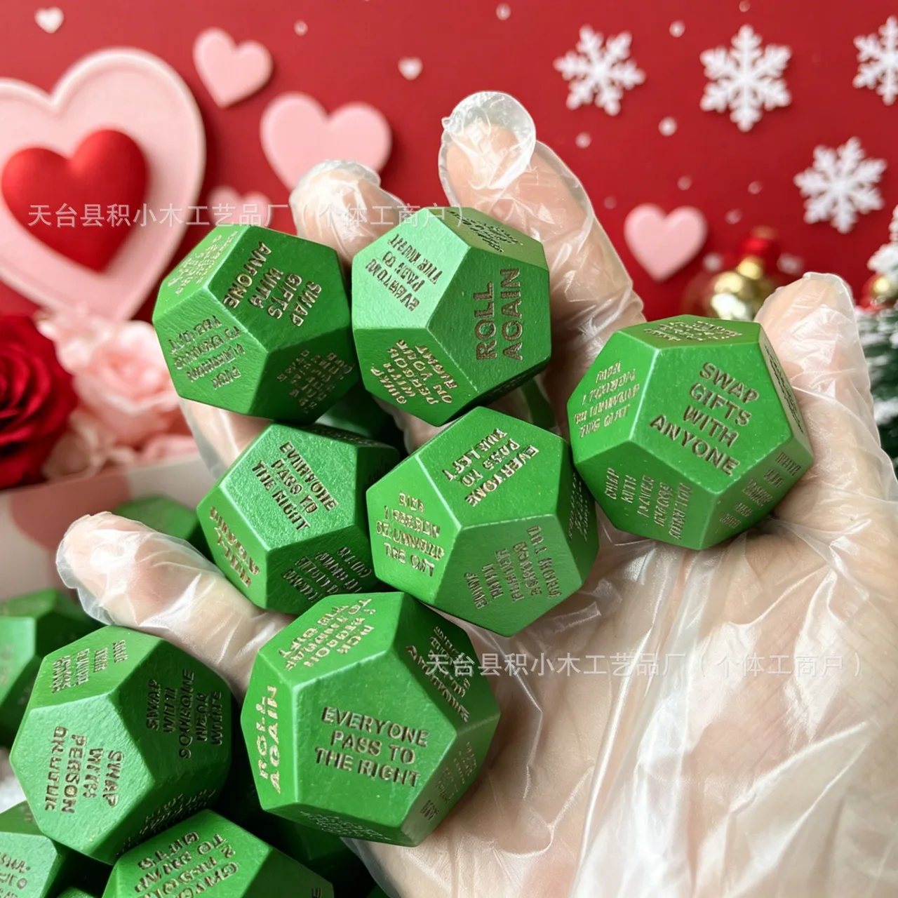 Close-up of the green gift-swap dice. One green die is included.